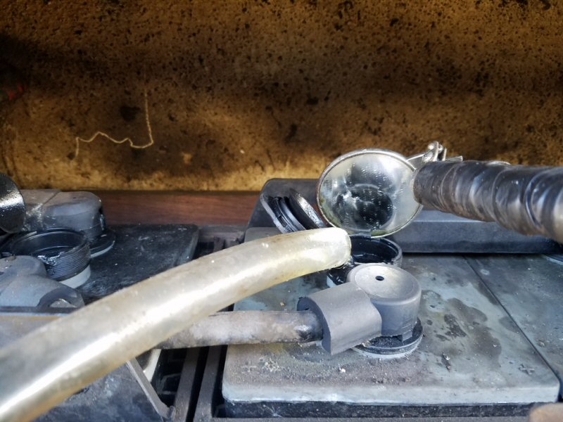 Topping up batteries using tool no. 1